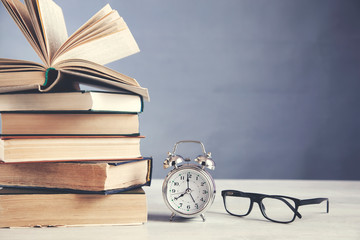 vintage clock and  books