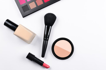 Professional makeup products with cosmetic beauty products, foundation, lipstick,  eye shadows, eye lashes, brushes and tools.