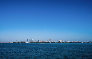 Fototapeta premium Amazing view of the ocean and the city of Dar es Salaam from the ferry on a sunny day Tanzania