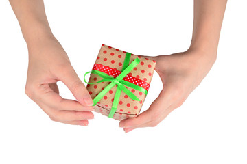 Present in woman hand on white background.