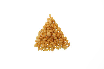 The concept of healthy eating. Pine nut. Isolated