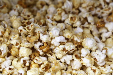 Scattered popcorn, selective focus, texture background