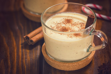 Two Glass of Eggnog with Cinnamon and Nutmeg for the Christmas