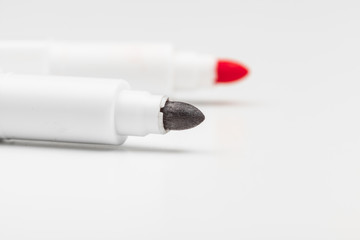 Colored markers isolated on white background