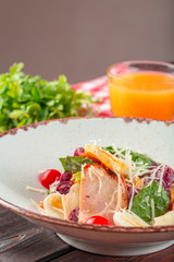 Chicken Salad. Chicken Caesar Salad. Caesar Salad with grilled chicken on plate