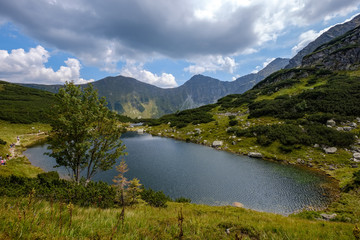 Naklejka na ściany i meble mountain lake in late summer in Slovakian Carpathian Tatra
