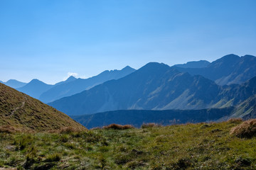 mountain top panorama in  autumn covered in mist or clouds