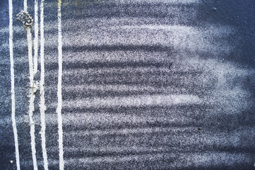 Black space background of shabby paint on an iron background. Stars and divorces, cosmic bursts and play     