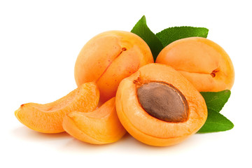 Apricot fruits with leaves isolated on white background macro