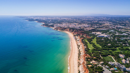 Fototapeta na wymiar Aerial view of Algarve Beach. Beautiful Falesia beach from above in Portugal. Summer vocation