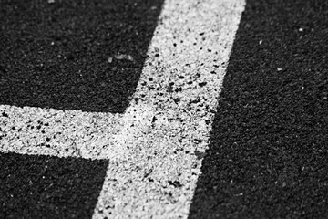 Monochrome markings on sports flooring