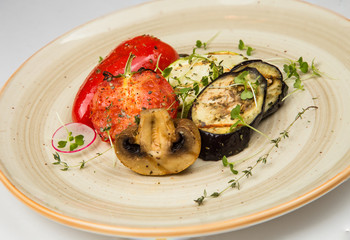 Grilled vegetables on a white background.