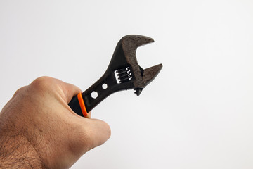 hand of a worker with a wrench