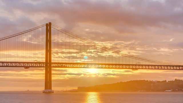 Lisbon city sunrise with April 25 bridge night to day timelapse