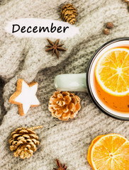 Obraz na płótnie Canvas Winter theme. Hot tea with spices,orange,cinnamon,anise,cookies