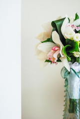 bridal bouquet of fresh roses on the table. wedding floristry, floristic decorative statement