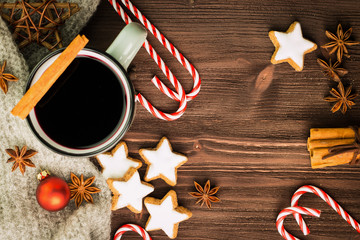 Winter theme. Hot steaming cup of glint wine with spices