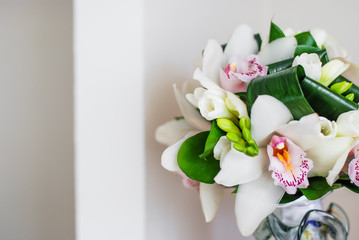 bridal bouquet of fresh roses on the table. wedding floristry, floristic decorative statement