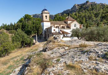 Fototapeta na wymiar Chapel of San Jose and Santa Barbara and a view of the castle, Xativa (Saetabis in Latin), province of Valencia, Spain