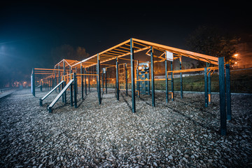 Sport workout night playground with nobody and beautiful view in dark colors