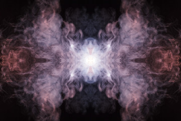 Abstract thick colored smoke on a black background with a monster face. The concept of light laser show at a musical concert and a print on a T-shirt