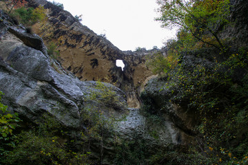 Waterfall Sopot (slap Copot) close to Buzet, Istria, Croatia, is a favourite climbing site. When active waterfall is falling through a cave in an abri (notch) celling. 