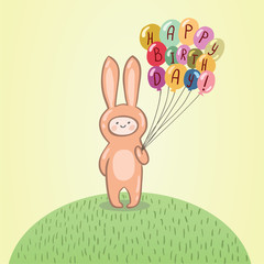 Cute kid in bunny costume holding balloons.