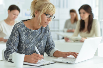 Portrait of a women working in office