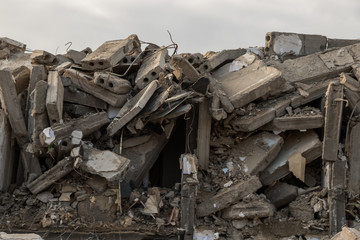 Fototapeta na wymiar destroyed building - Concrete debris from destroyed building 