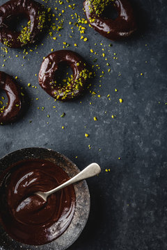 doughnuts with chocolate and pistachios