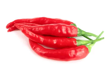 Fotobehang red hot chili peppers isolated on white background © kolesnikovserg
