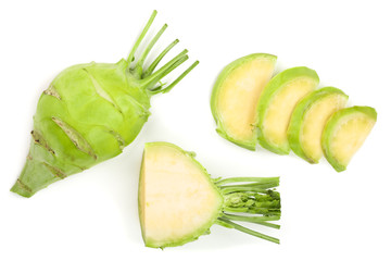Fresh kohlrabi with green leaves isolated on white backround. Top view. Flat lay