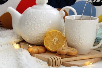 teapot and cup of tea on wooden table