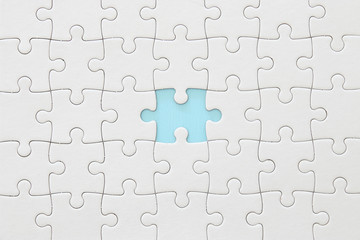 background of white puzzle with missing piece. - obrazy, fototapety, plakaty