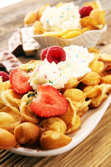 Hong Kong style egg waffle on wooden board. bubble waffle