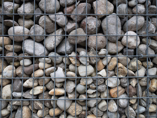 Stone wall in cage