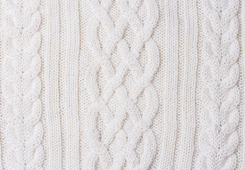 Warm white Knitted Items with Braids and Pattern