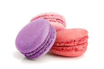 three macaroons isolated on white background closeup