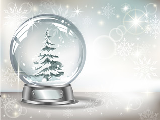 Greeting card with vector realistic transparent silver  snow globe  with snow and christmas tree  on a light abstract background