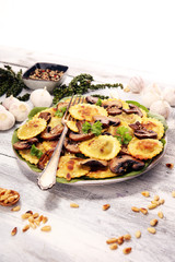 Ravioli with spinach or Pumpkin Tortellini with chard and mushrooms.