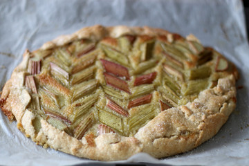 Baked sweet rhubarb galette. Selective focus.