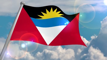 The flag of the state of Antiqua and Barbuda develops in the wind against a blue sky with cumulus clouds and a flash on the lens from the sun. 4K video is looped and decoded from a 3D program.