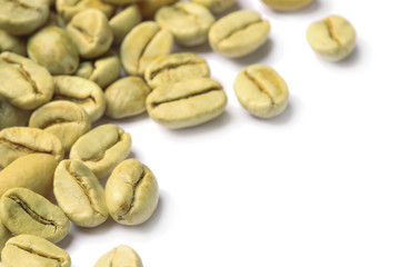 Green coffee beans and space for text on white background