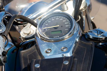 Chromed speedometer of the motorcycle close-up