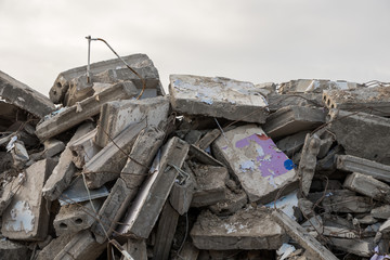  destroyed building - concrete and metal debris of a destroyed building - destroyed building