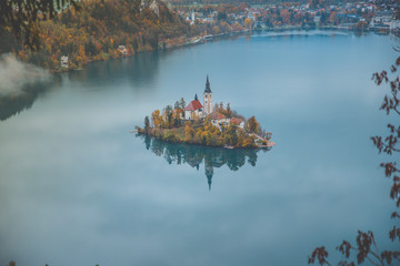 Obraz premium Autumn View On Bled Lake, Island,Church And Castle With Mountain Range