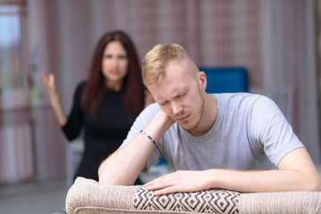 The concept of family conflict, problems, relationships of young disgruntled husband and wife in a...
