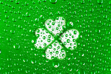 water drops with a lot of clover green background for st patrick's day