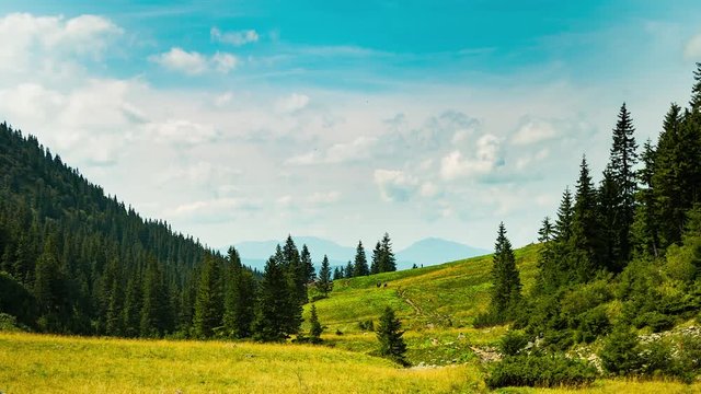 Time lapse. Dynamic sky over valley in mountain