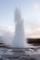 Fototapeta na wymiar eruption of geyser Strokkur during dusk, Iceland
